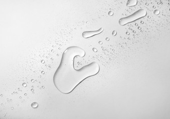 Water drops on light grey background