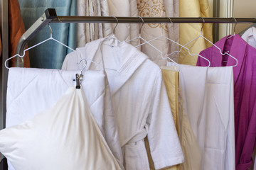 Fototapeta na wymiar robes and linen on a hanger