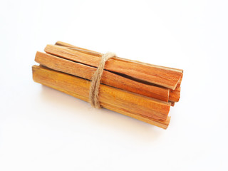 sappan wood or sappan tree on white background is a chinese herb and suitable to invigorate blood ,remove stagnation and lowers risk of heart disease use for herb tea product or health care concept.