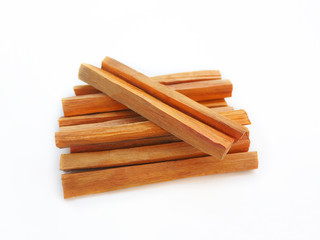 sappan wood or sappan tree on white background is a chinese herb and suitable to invigorate blood ,remove stagnation and lowers risk of heart disease use for herb tea product or health care concept.