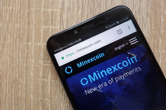 KONSKIE, POLAND - JULY 14, 2018: MinexCoin (MNX) cryptocurrency website displayed on a modern smartphone