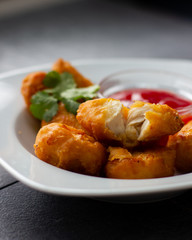 Crispy chicken nuggets with ketchup