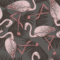 Pink flamingo and palm leaves seamless pattern