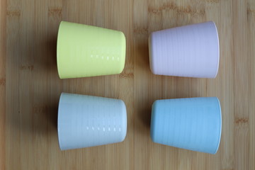 pale coloured plastic cup beakers