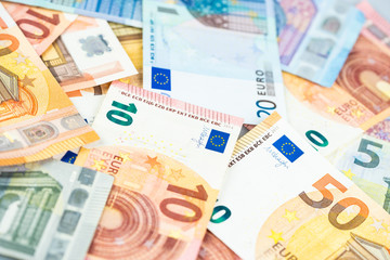 Pile of paper euro banknotes, european payment system, euro money cash, financial background