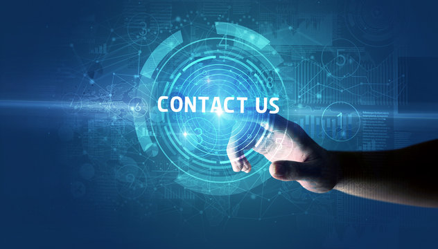 Hand touching CONTACT US button, modern business technology concept