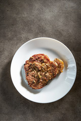 Meat with spice and herb on grill 