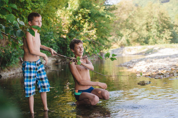 Childrens playing and splashing in the river