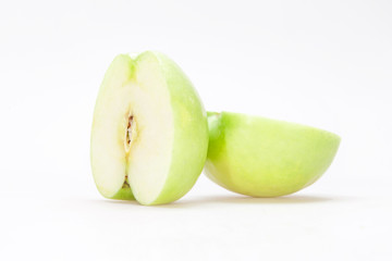 Closeup macro of two halves of a apple on the white