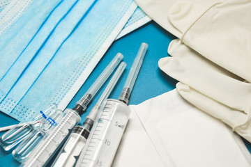 Medical equipment. Coronavirus protection. Medical face mask. Sterile gloves. Syringe and drugs....