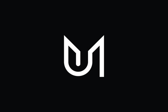 Minimal elegant monogram art logo. Outstanding professional trendy awesome artistic MU UM initial based Alphabet icon logo. Premium Business logo in White color on black background