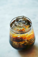 Iced coffee in glass with ice 