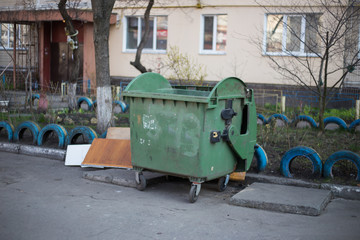 Fototapeta na wymiar Simple trash can on the street in Kiev