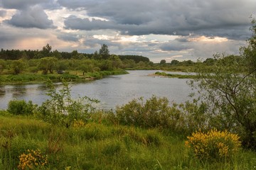 cloudy clouds over the river in summer