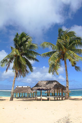 Beach fale, a simple open 'hut' (faleo'o Samoan language), popular in budget eco-tourism in Samoa. Beautiful day fale at Upolu island © peacefoo