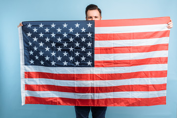 Young man with an American flag