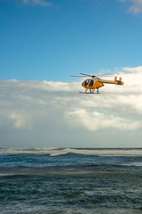 A Search and Rescue Helicopter Over Stormy Pacific Ocean