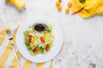 A plate of salad a table