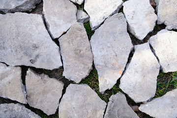 pieces of gray concrete on the ground, background and pattern