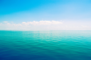 Beautiful sea horizon on a background of blue sky.