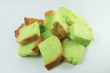 slices of bread on a plate on white background.