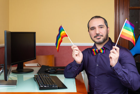 Man With Lgbt Flags And Bow Tie Teleworking