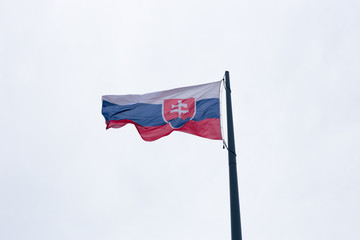 Three-colored flag of Slovakia waving in the wind
