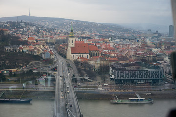 Fototapeta na wymiar View of the Danube River and Bratislava from the panoramic cafe in Bridge of the Slovak National Uprising
