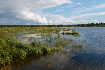 cloudy clouds over the river in summer