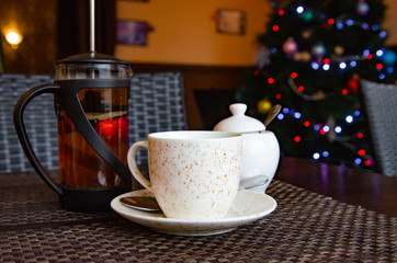 coffee and tea on a table in a coffee shop