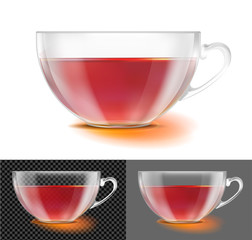 Transparent glass tea cup with black tea