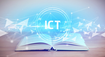 Open book with ICT abbreviation, modern technology concept