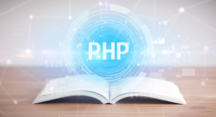 Open book with PHP abbreviation, modern technology concept