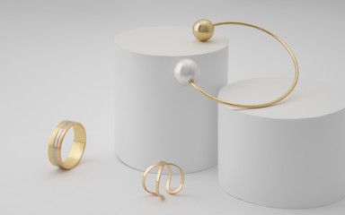 Golden with pearl bracelet and golden rings on white round platform on white background