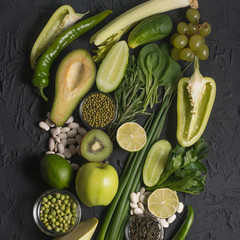 Healthy Composition of raw green vegetables and fruits. Cancer prevention - green food.