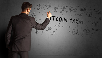 businessman drawing a creative idea sketch with BITCOIN CASH inscription, business strategy concept