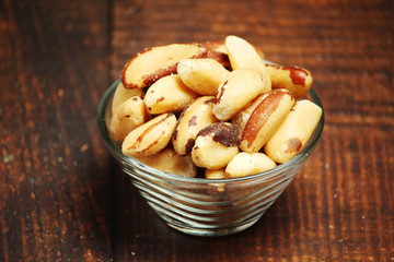 A bowl with peeled Brazil nuts	