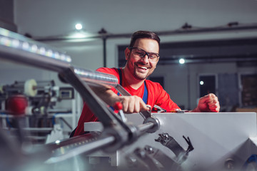 Maintenance engineer repair modern industrial machine.