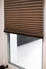 Pleated blinds Cosiflor with small fold 20mm close up on the window. Brown color bottom up top down home shades. Luxury cordless blinds.