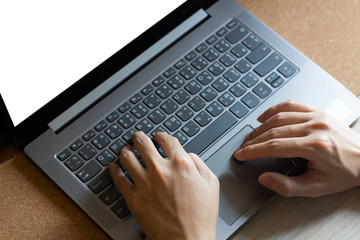 Fototapeta premium Businessman hand using laptop computer in office