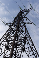 power transmission tower on background of blue sky