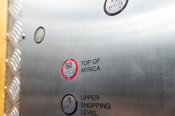 Naklejka premium Button in the elevator indicating 50th floor named Top of Africa, Johannesburg