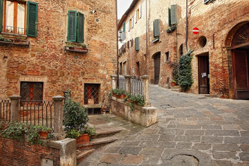 Obraz na płótnie Canvas Beautiful Italian street of small old provincial town