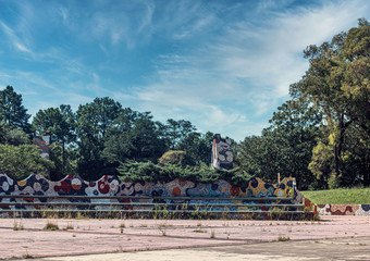 Fototapeta na wymiar Abandoned rides at an abandoned amusement park