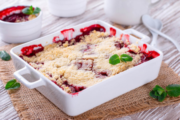 Berry crumble in white dish