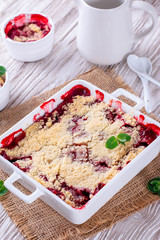 Berry crumble in white dish