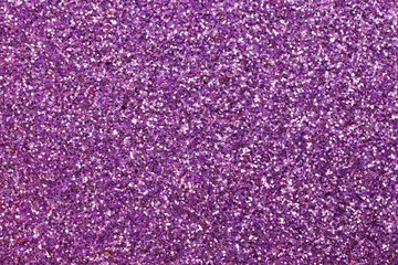 glitter on the glittery purple background ideal as a backdrop