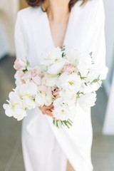  Floristics in the style of fine art in Europe. Light bouquet of peonies and roses. Modern wedding...