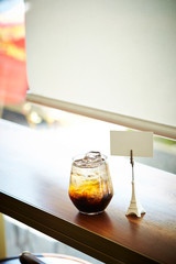 Iced coffee with card stand