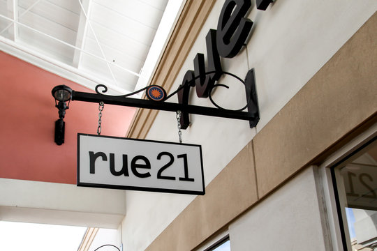 Orlando, Florida, USA - February 5, 2020: Rue21 store sign in Orlando, Florida, USA. New rue21 LLC (rue21) is an American specialty retailer of women's casual apparel and accessories. 